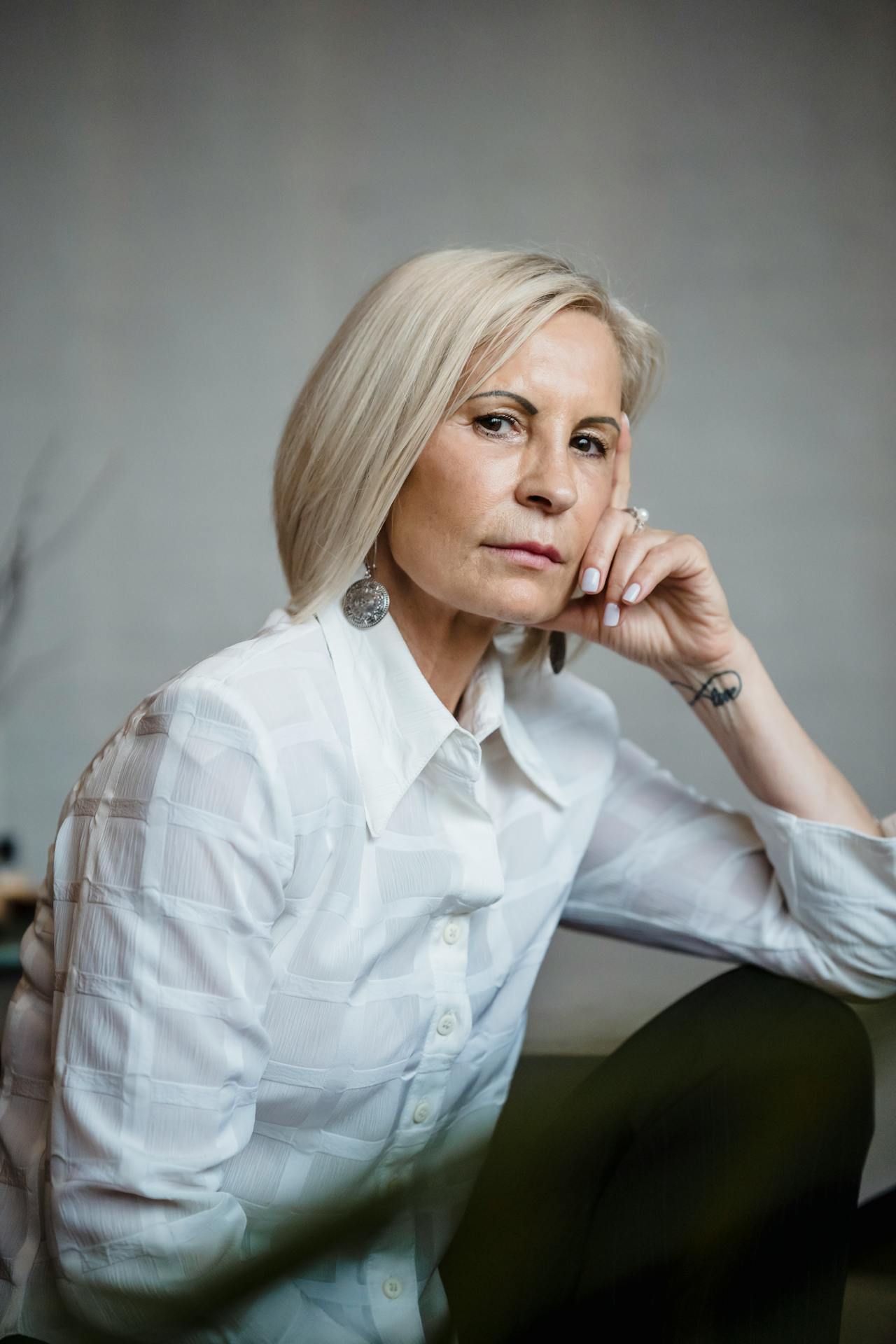 Menopause baseline reference selfie of a mature woman, no makeup